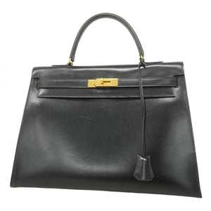 【5hb0655-h】エルメス ハンドバッグ ケリー35 ボックスカーフ ブラック ゴールド金具 〇P刻印【中古】レディース