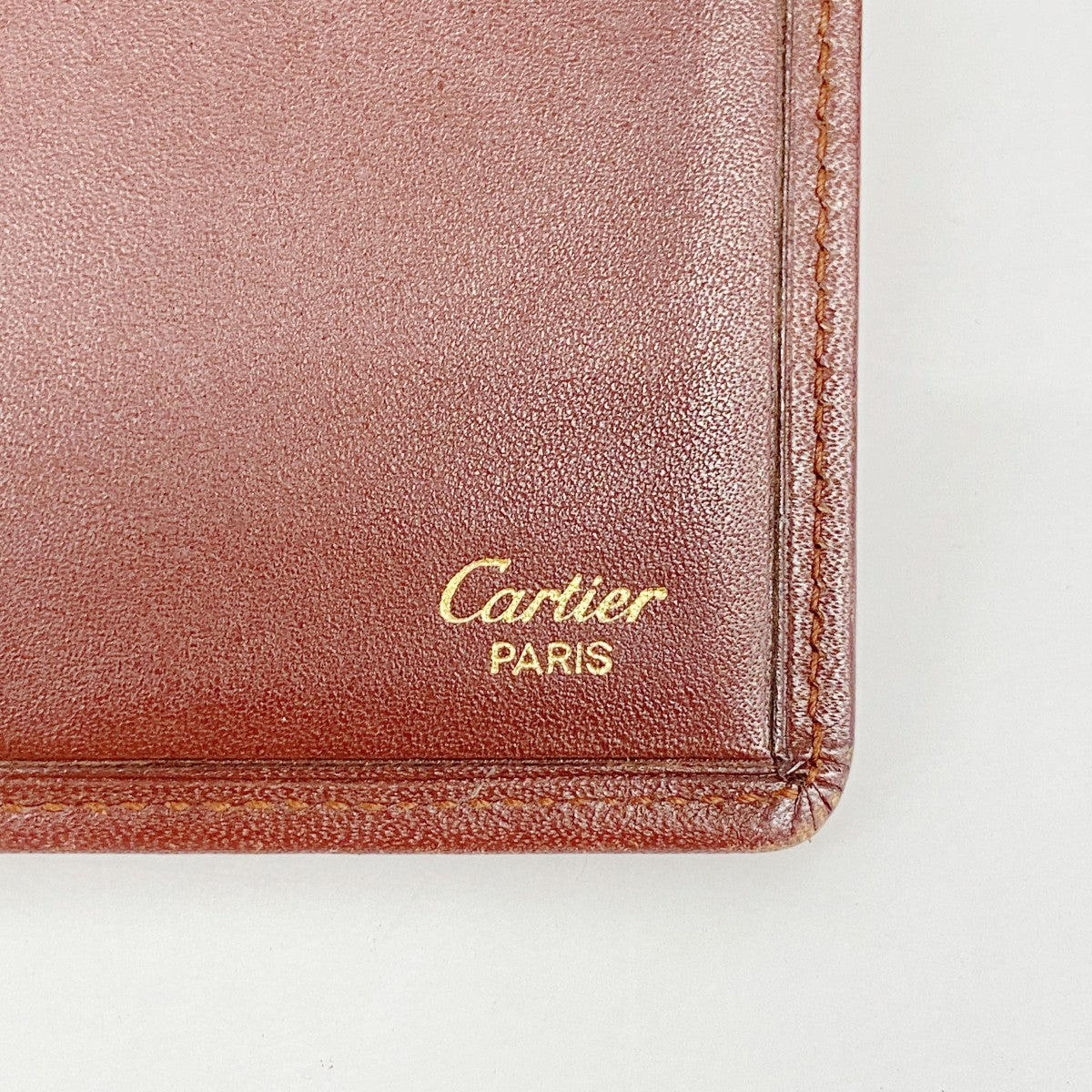 5pd4979】カルティエ 長札入れ マスト レザー ボルドー ゴールド金具