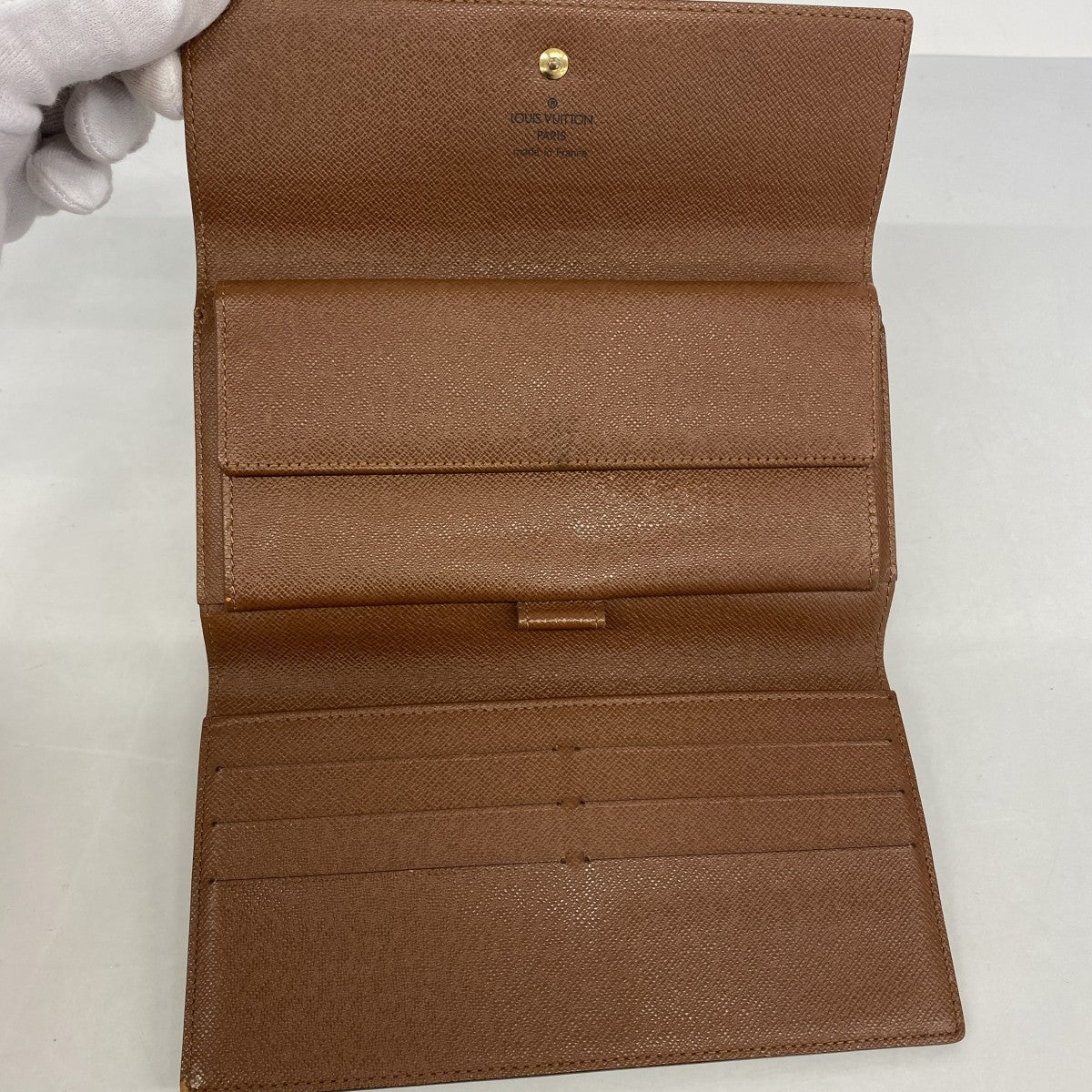 【6fb2716】ルイヴィトン 三つ折り長財布 モノグラム ポルトトレゾールインターナショナル M61215 ブラウン【中古】レディース