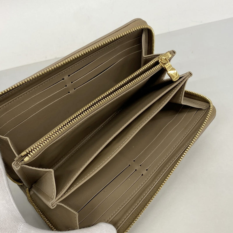 【6fc3288-k】ルイヴィトン 長財布 モノグラム・エンボス ジッピーウォレット M81511 トープ【中古】レディース