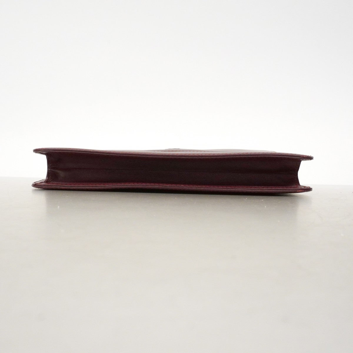 【6fd4685】カルティエ クラッチバッグ マスト レザー ボルドー ゴールド金具【中古】メンズ