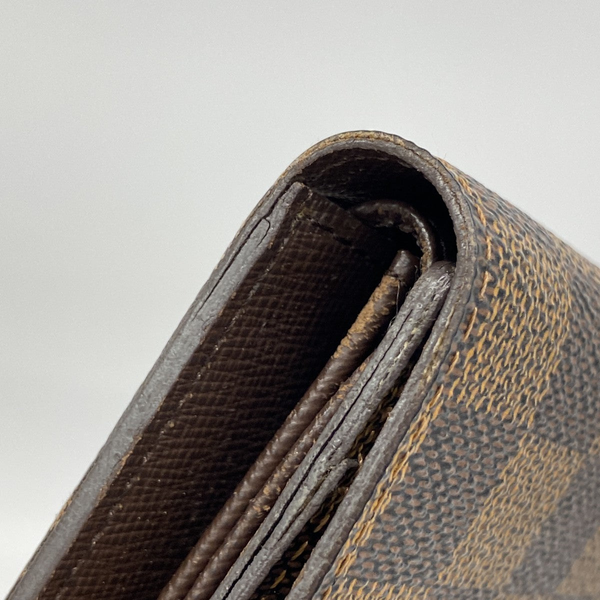【6fd4732】ルイヴィトン 三つ折り長財布 ダミエ ポルトフォイユインターナショナル N61217 エベヌ【中古】レディース