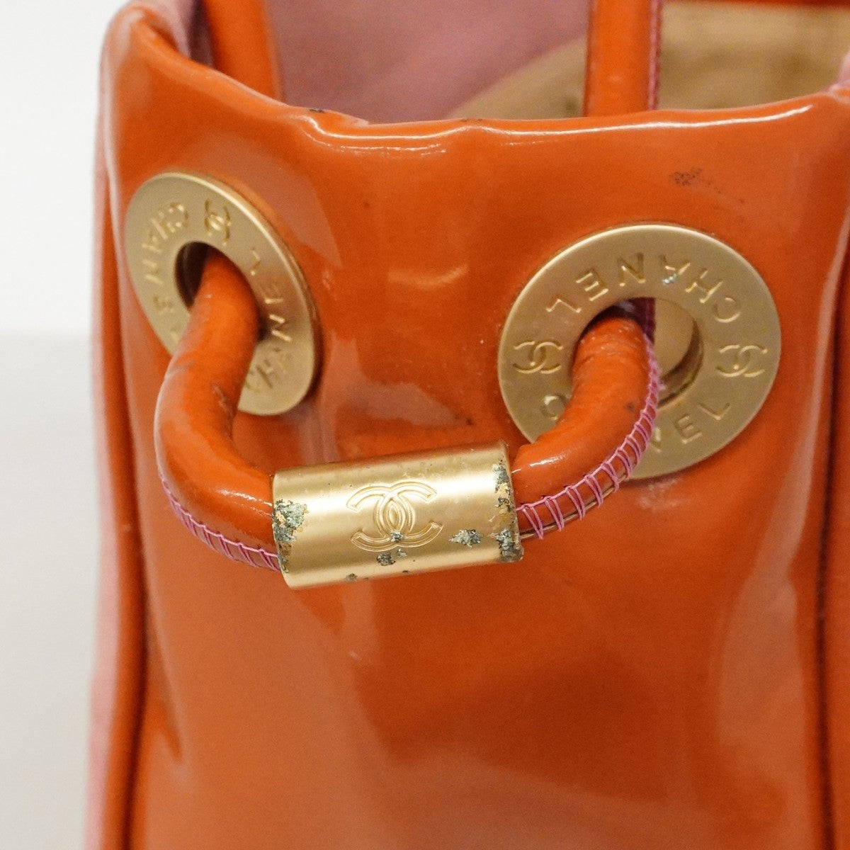 【6fd5461】シャネル トートバッグ カメリア スウェード パテントレザー ピンク オレンジ シャンパンゴールド金具【中古】レディース
