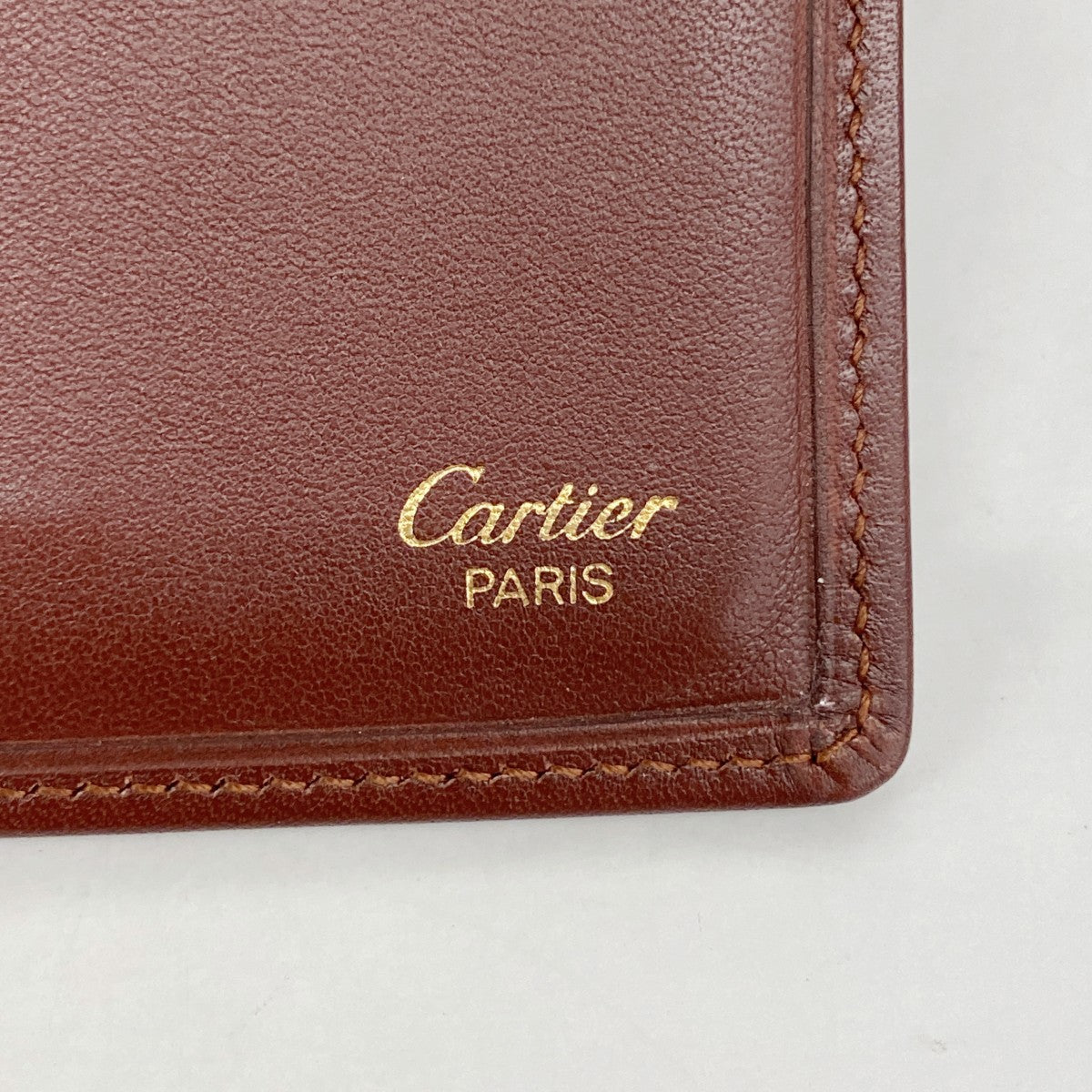 【6fd5551】カルティエ 札入れ マスト レザー ボルドー ゴールド金具【中古】メンズ