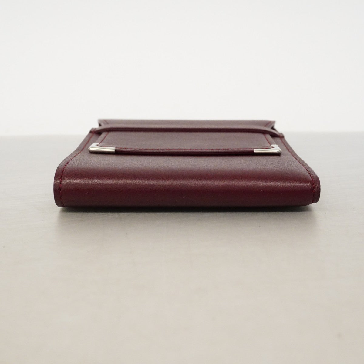 【6gc2805】カルティエ 三つ折り財布 マスト レザー ボルドー シルバー金具【中古】メンズ
