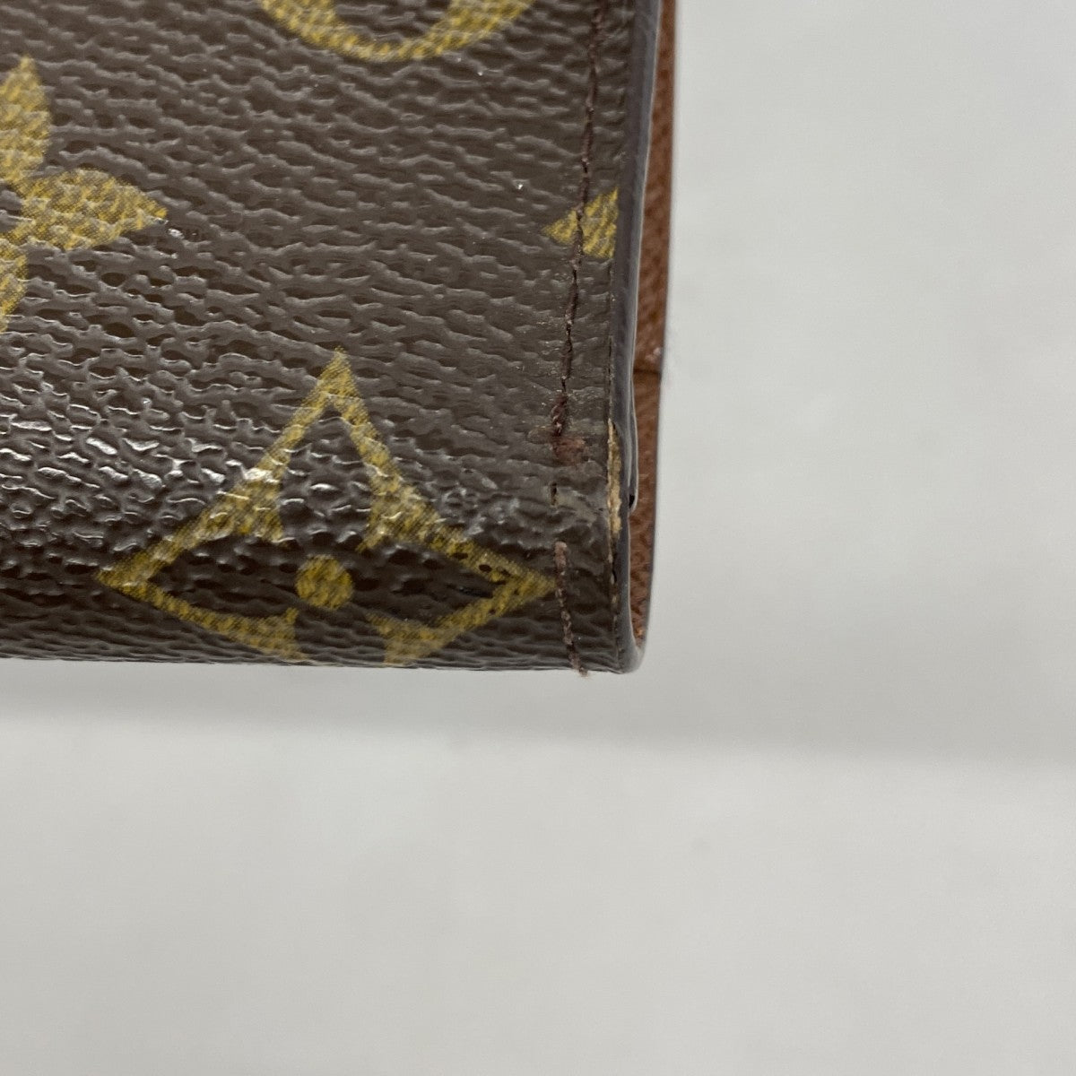 【6gc2977】ルイヴィトン 三つ折り長財布 モノグラム ポルトトレゾールインターナショナル M61215 ブラウン【中古】レディース