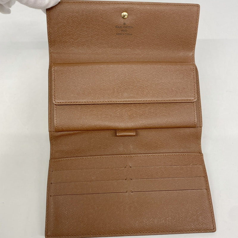 【6gc2977】ルイヴィトン 三つ折り長財布 モノグラム ポルトトレゾールインターナショナル M61215 ブラウン【中古】レディース