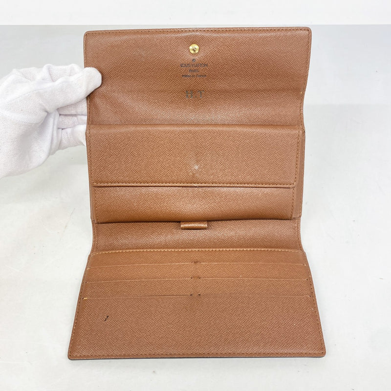 【6gd4228】ルイヴィトン 三つ折り長財布 モノグラム ポルトフォイユインターナショナル M61215 ブラウン【中古】レディース