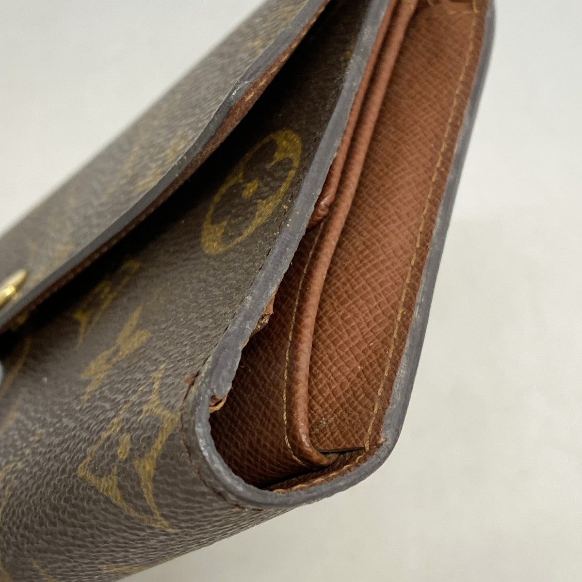 【6gd4481】ルイヴィトン 三つ折り長財布 モノグラム ポルトフォイユインターナショナル M61215 ブラウン【中古】メンズ レディース ユニセックス