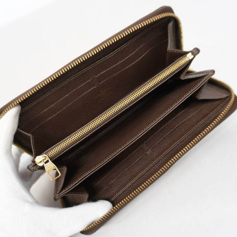 【6ge6316-k】ルイヴィトン 長財布 モノグラム・アンプラント ジッピーウォレット M60548 テール【中古】レディース