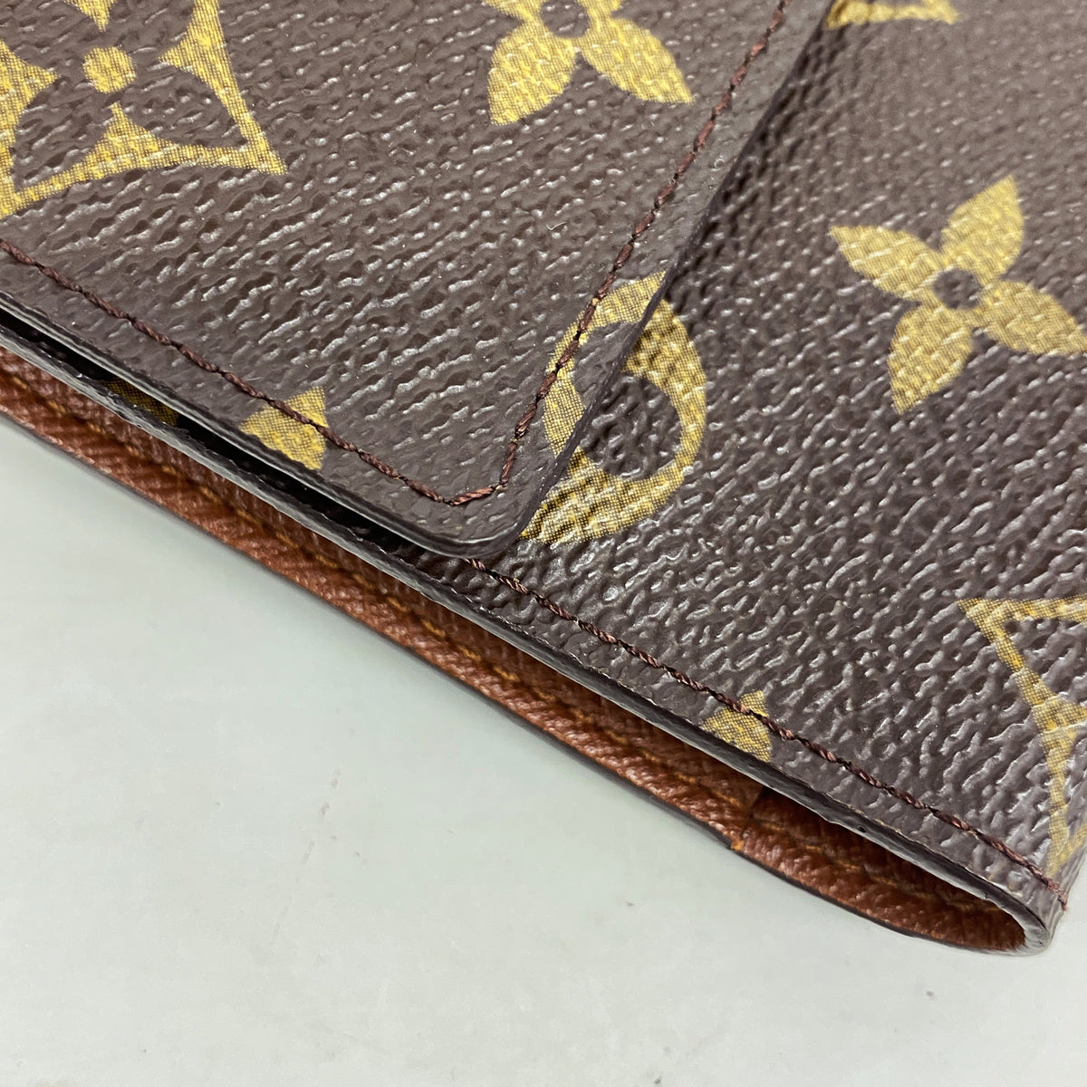 【6ha0019】ルイヴィトン 三つ折り長財布 モノグラム ポルトフォイユインターナショナル M61217 ブラウン【中古】レディース