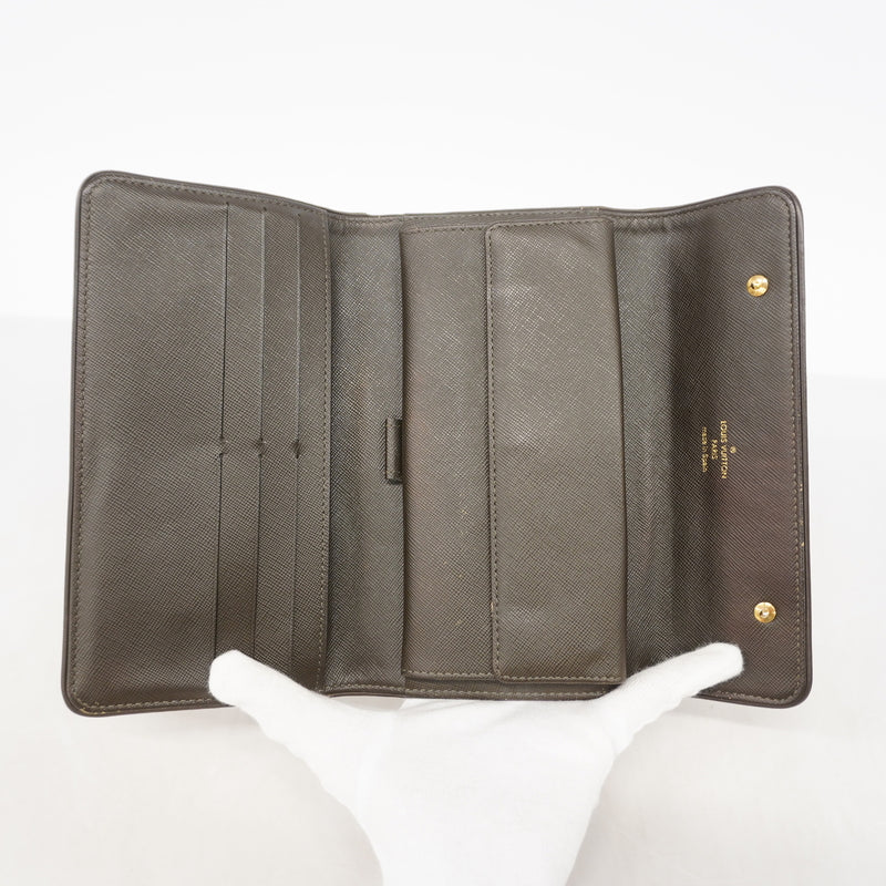 【6hc1501-k】ルイヴィトン 三つ折り長財布 モノグラム・ミニ ポルトトレゾールインターナショナル M92243 カーキ【中古】レディース