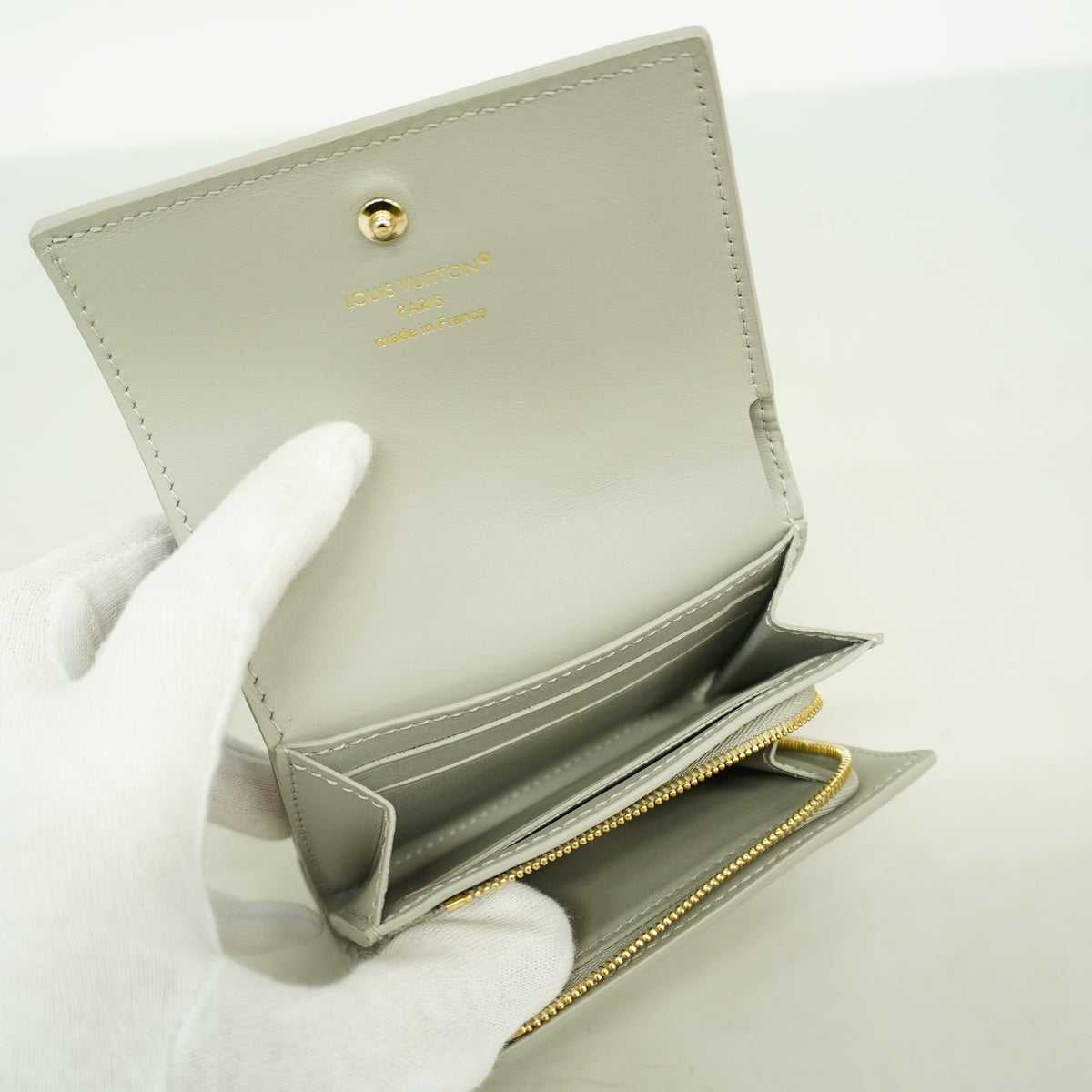 【6he5179-k】ルイヴィトン 三つ折り財布 トリヨン ポルトフォイユカプシーヌタイニー M12406 フリントグレー【中古】レディース