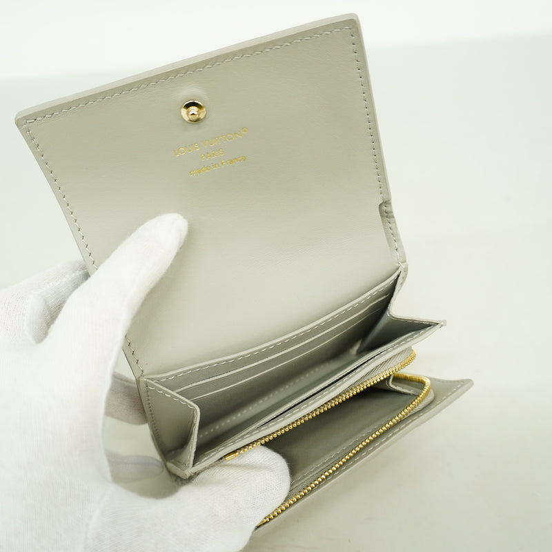 【6he5179-k】ルイヴィトン 三つ折り財布 トリヨン ポルトフォイユカプシーヌタイニー M12406 フリントグレー【中古】レディース