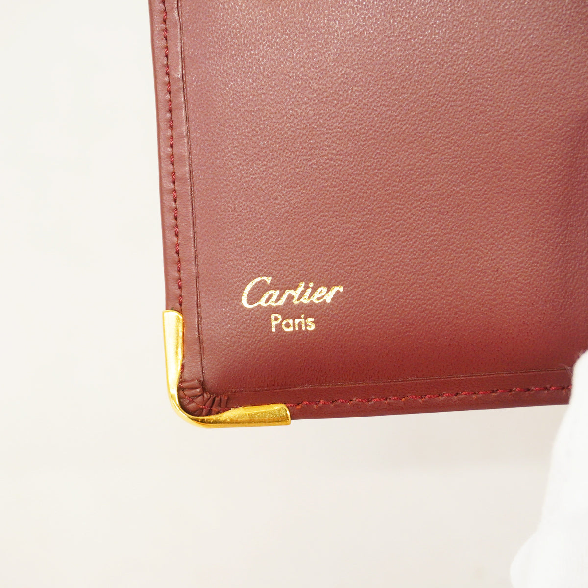 【6he5409】カルティエ 三つ折り財布 マスト レザー ボルドー ゴールド金具【中古】レディース