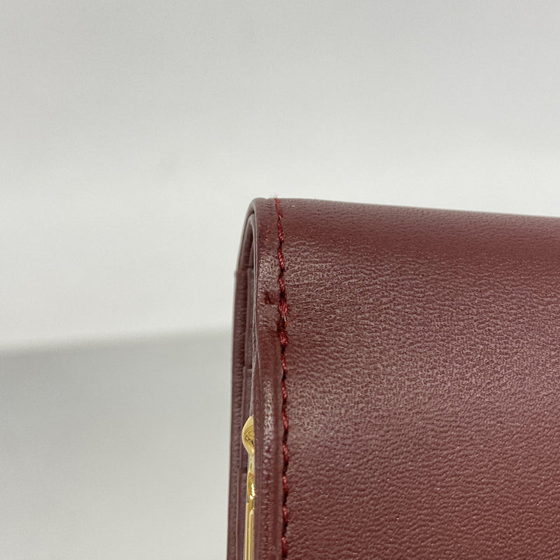 【6hf6163】カルティエ 三つ折り財布 マスト レザー ボルドー ゴールド金具【中古】レディース