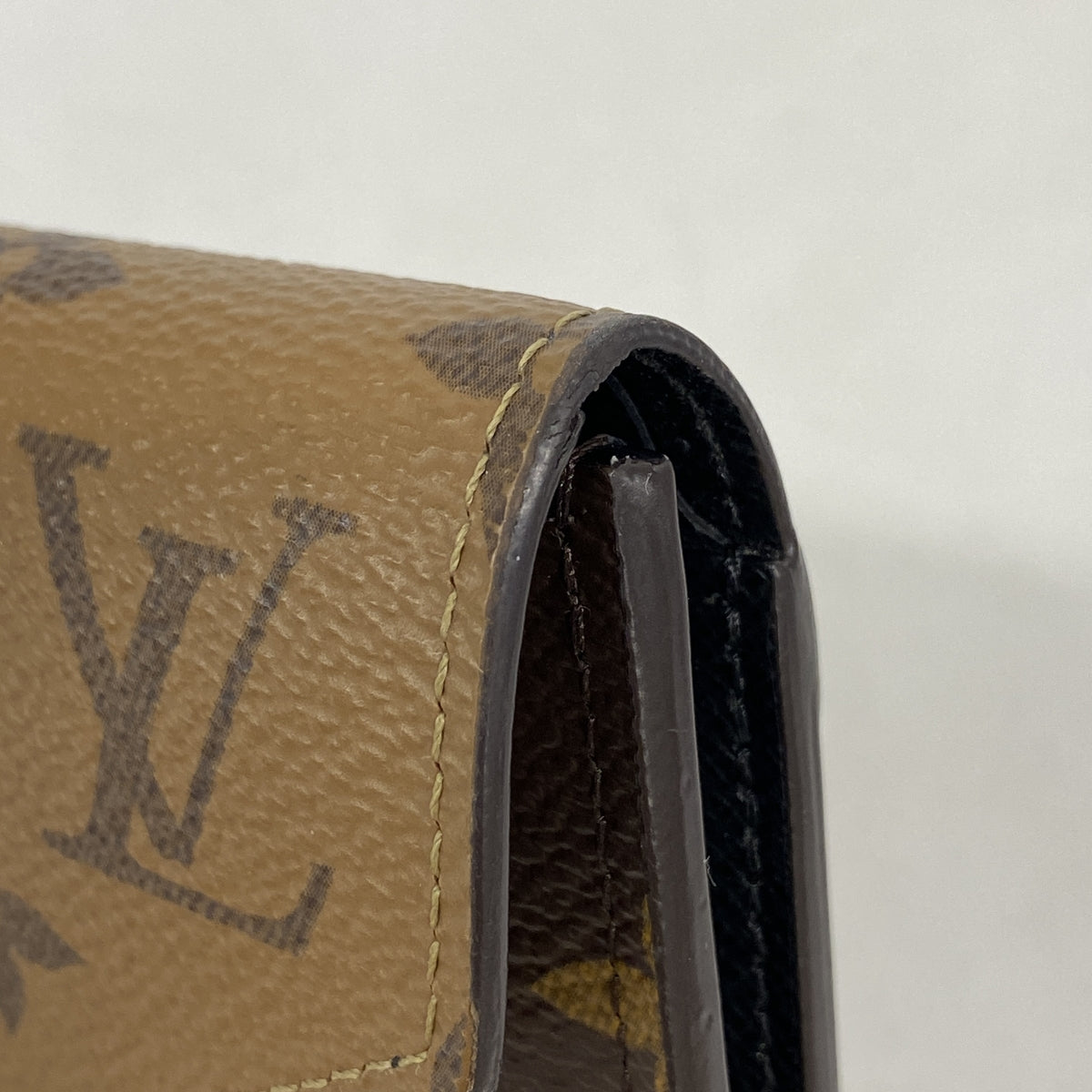 【6ib2574】ルイヴィトン 三つ折り財布 モノグラム・リバース ポルトフォイユヴィクトリーヌ M81557 ブラウン【中古】レディース