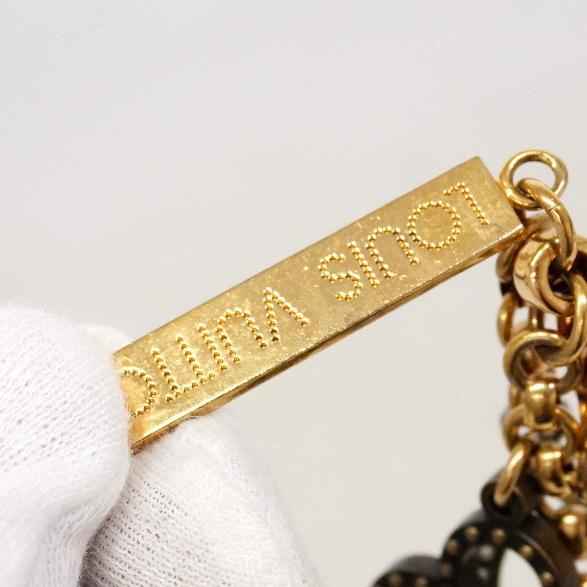 【6ic4693】ルイヴィトン キーホルダー・チャーム ビジューサックパージュ M65090 ゴールド シルバー【中古】レディース