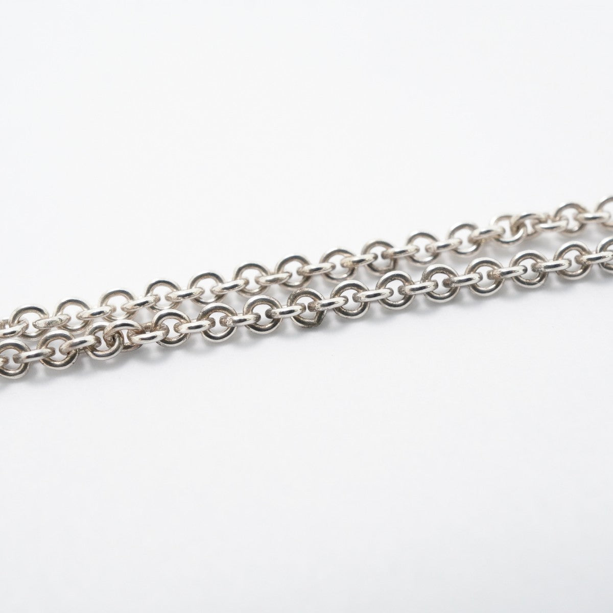 【6jfb0368-k】ティファニー ネックレス シグネチャークロス K18YG イエローゴールド シルバー925【中古】レディース