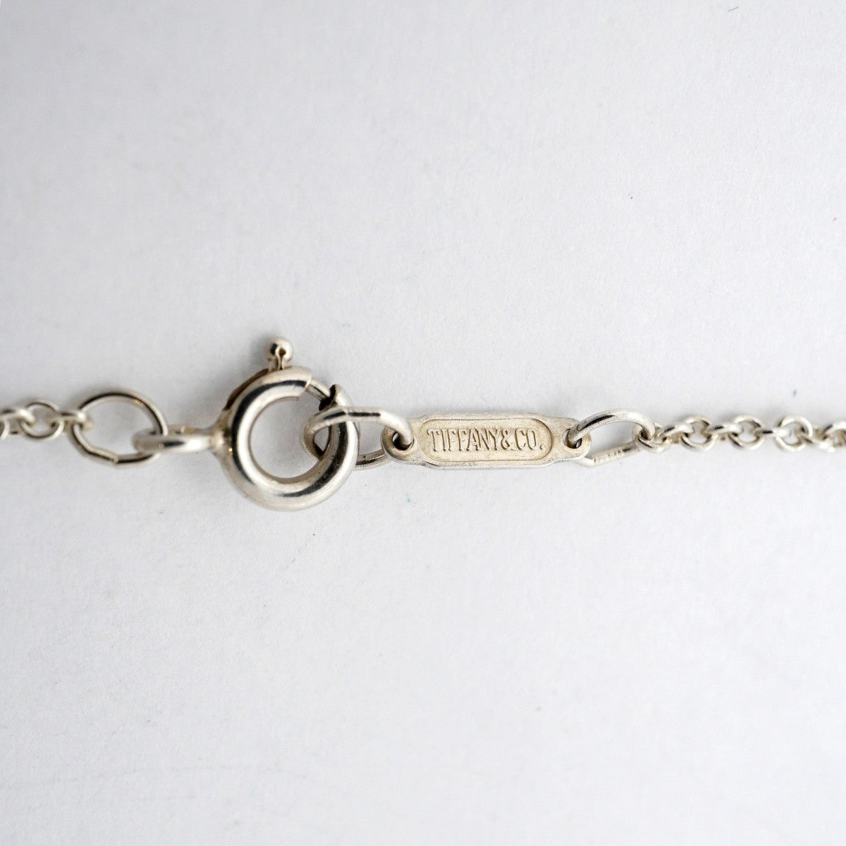 【6jfb0932-k】ティファニー ネックレス シグネチャークロス K18YG イエローゴールド シルバー925【中古】レディース