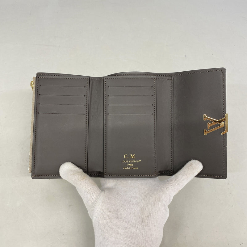 【6ka0556】ルイヴィトン 三つ折り財布 トリヨン ポルトフォイユカプシーヌコンパクト M62159 ガレ【中古】レディース
